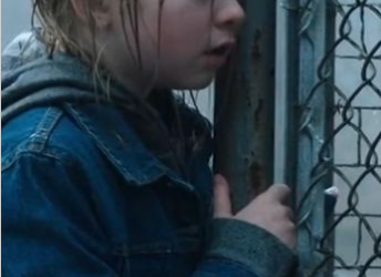 21 A Little Girl Crying in the Rain Held a Cage Door Open — And When an Old Man Ran Toward Her, Everything Changed